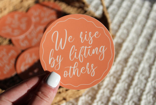 We Rise By Lifting Others Sticker